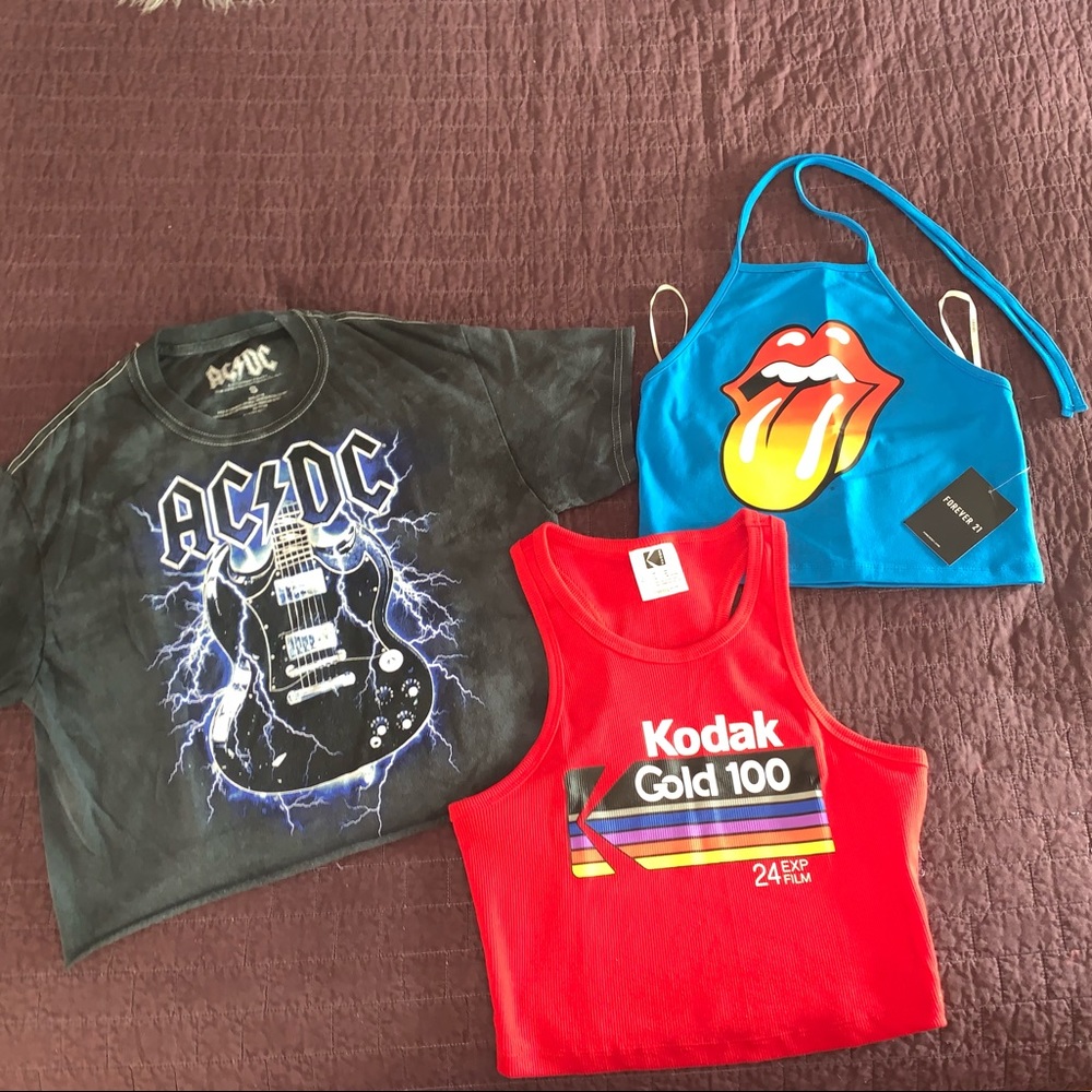 3 graphic shirts, different cuts.